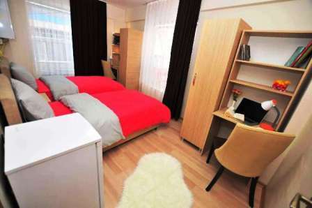 single bed dorm room